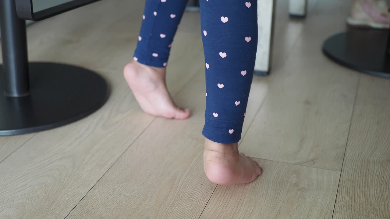 Child walking barefoot