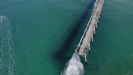 tweed sand bypass and letitia beach with turquoise seascape in nsw, australia - aerial drone shot