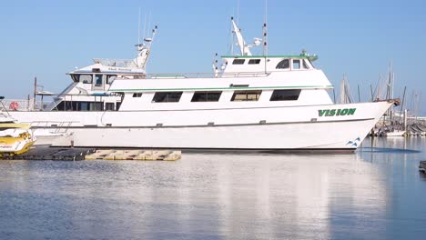 2019 - boats similar to the conception dive boat owned by truth aquatics sit in santa barbara harbor following the tragic dive boat fire near the channel islands 1