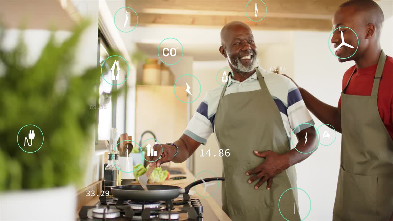 Senior man cooking on stovetop, son leaning placing hand helping, green icons drifting around cooks