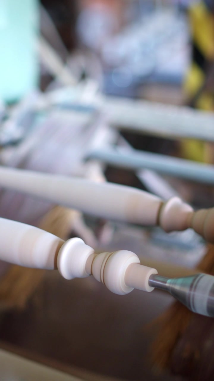 Close-up of Wood Spindle Turning on a Lathe
