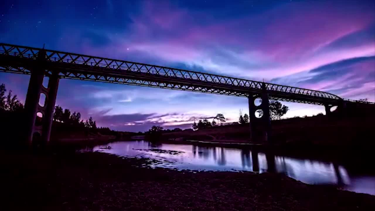 Day to night sunset timelapse of a bridge in Luskintyre with stars and comments