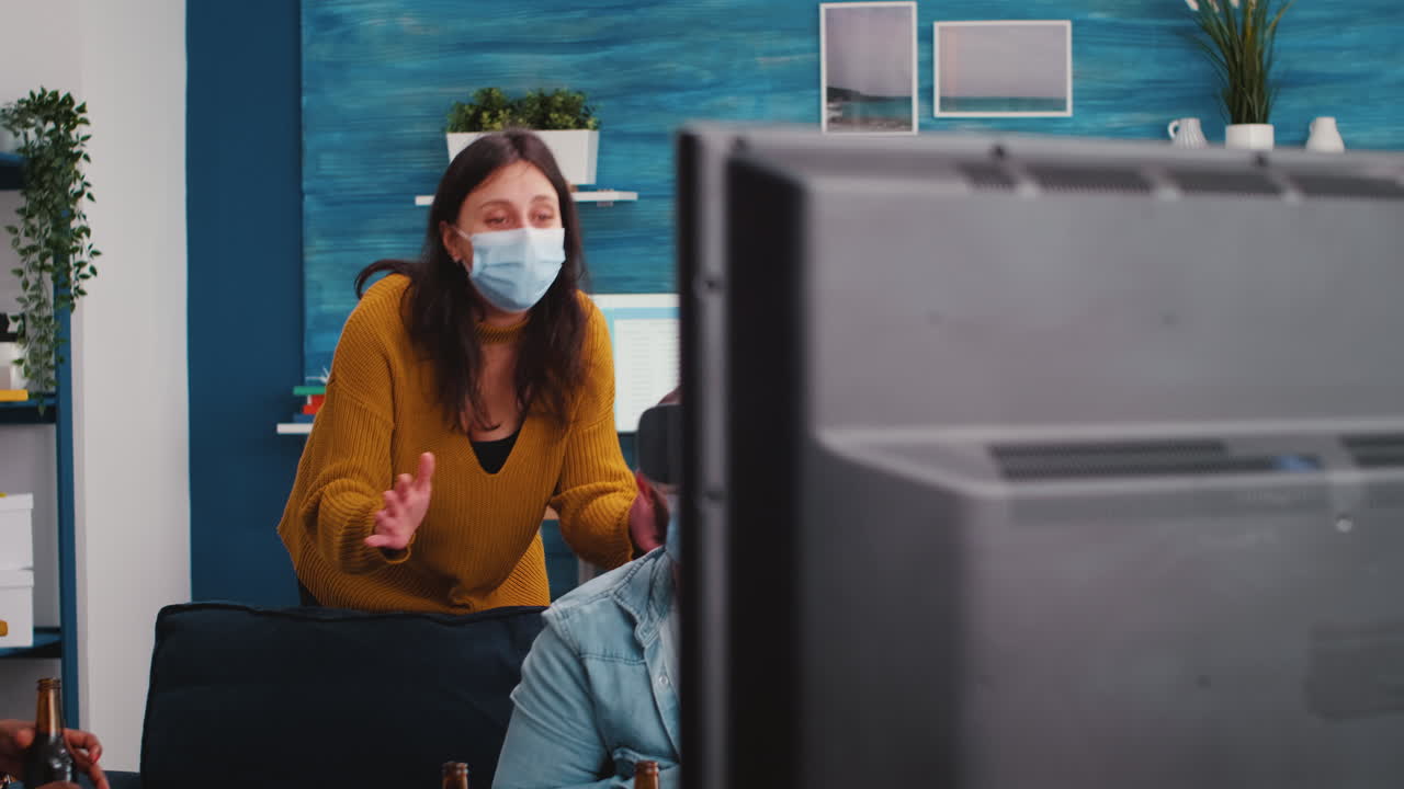 Diverse friends trying to win playing video games experiencing vr headset