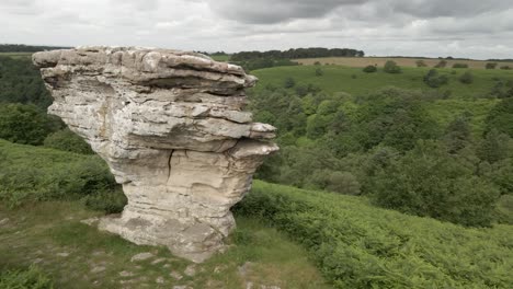 4k-Aerial-orbit-footage-of-Bridstones-in-Dalby-forest,-North-Yorkshire