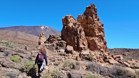 stunning rocky landscape of roques de garcia, with a hiker walking through nature