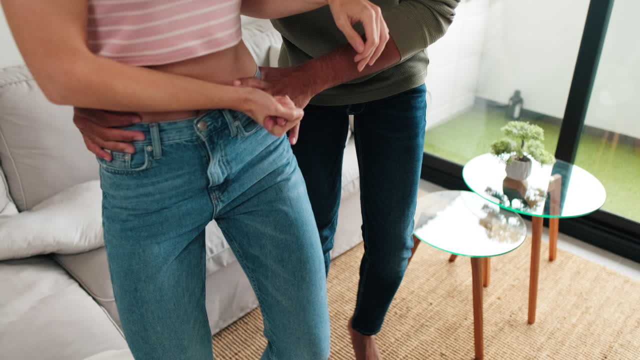Happy Couple Dancing Together At Home