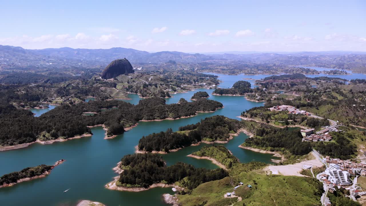 Aerial Shot Of Piedra Del Penol Horizon Over The Guatape Laguna In Colombia Antioquia