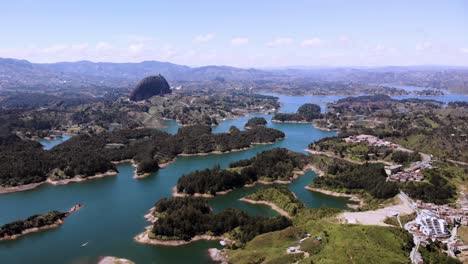aerial shot of piedra del penol horizon over the guatape laguna in colombia antioquia