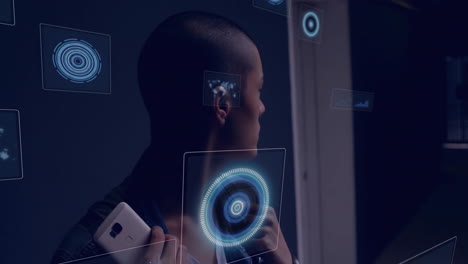 man holding smartphone and adjusting strap indoors, displaying floating blue hud elements in tech
