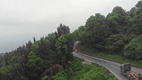 Heavy-traffic-at-Hai-van-pass-Vietnam-during-cloudy-day,-aerial