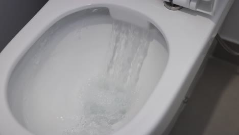 sequence of a bathtub filling with water