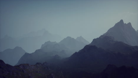 a misty mountain landscape shrouded in fog