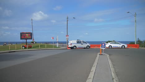 closed road - emergency vehicles parked - clovelly beach, sydney, australia