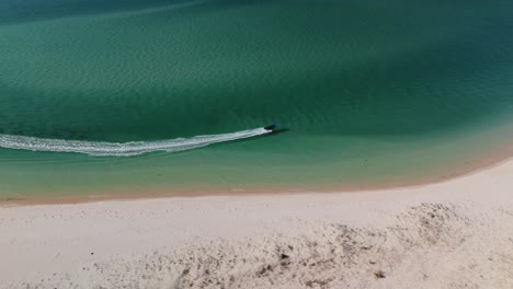 Jetskiing-In-The-Blue-Sea-Near-The-Beach-Shore-In-Portugal