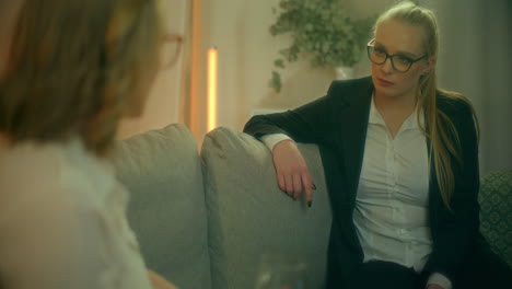 psychologist listens to client's problems during therapy