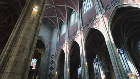 saint bavo's cathedral interior, belgium, gothic arches, stained glass windows, calm