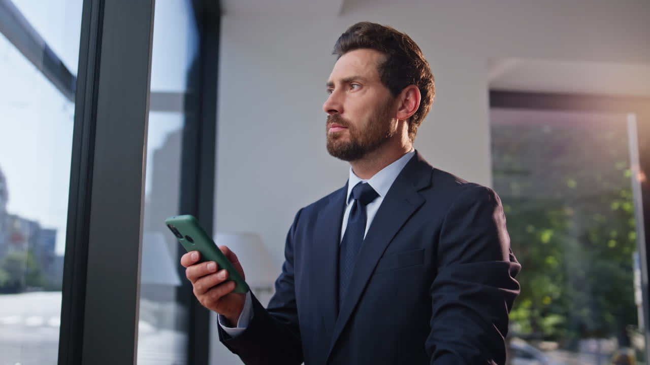 Smiling business owner texting cellphone enjoying coffee in restaurant closeup