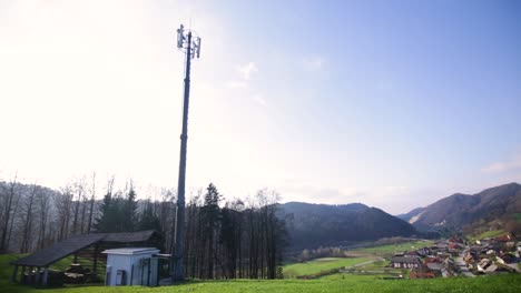 telecomunication antenna on top of the hill