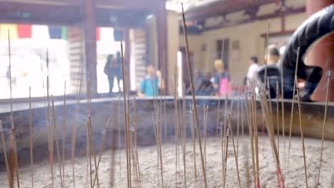 prayer incense outside monastery in singapore