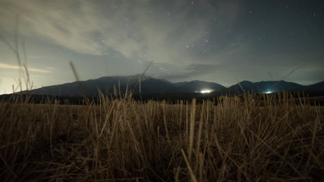 Moving-Timelapse-Milky-way-Mountain-Olympus-Greece-wheat-foreground-wide-shot