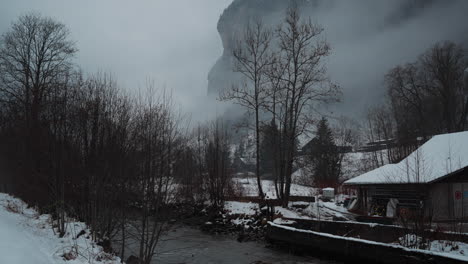 serene view of the weisse lütschine river in lauterbrunnen, switzerland, captured on a tranquil, snowy winter day, showcasing the ethereal beauty of nature