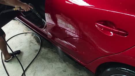 washing a red car