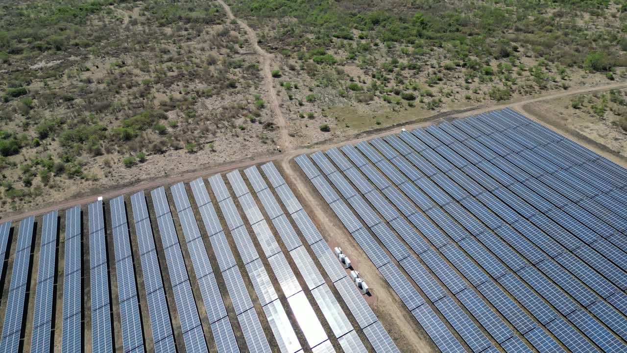 Aerial view of large-scale solar power farm generating clean energy for sustainable future