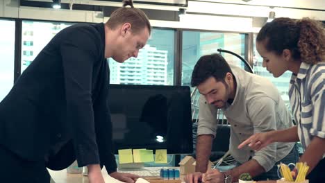 creative business people group having conversation at office desk in workplace.