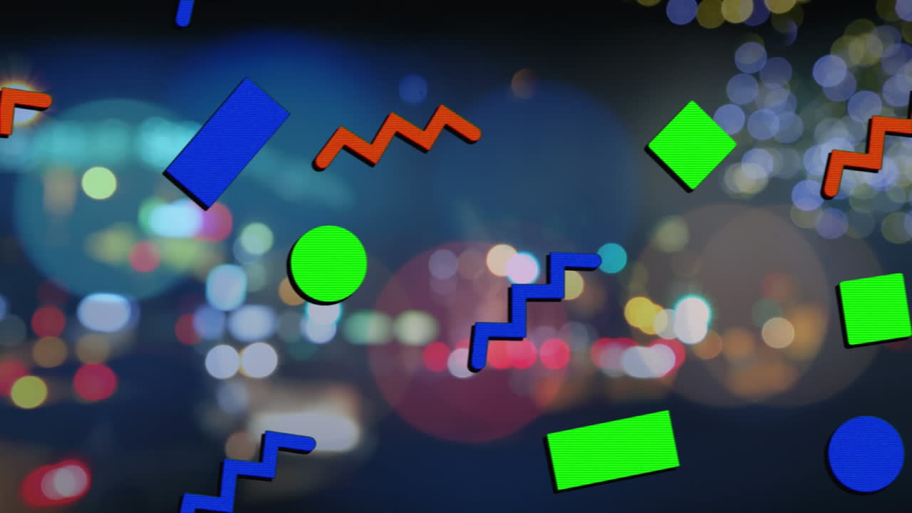 다양한 기하학적 모양의 애니메이션이 흐릿한 밤 도시 풍경 위로 움직입니다.