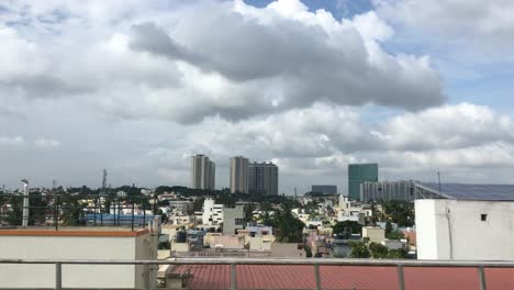 Skyline-of-city-of-Bangalore,-India-while-riding-with-a-train
