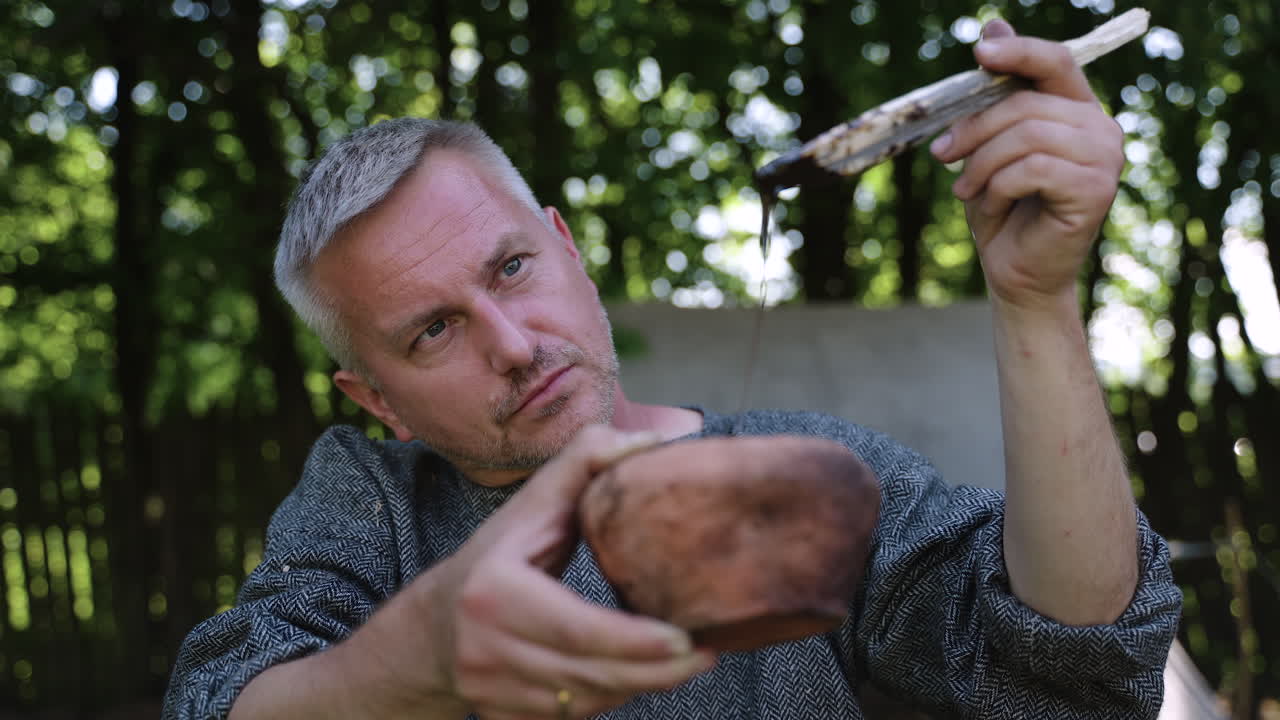 Archaeologist experimenting with ancient food coloring techniques