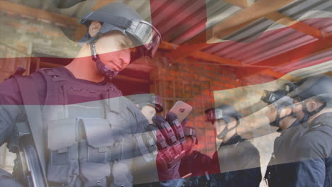 animation of flag of england over diverse soldiers with armour and smartphone