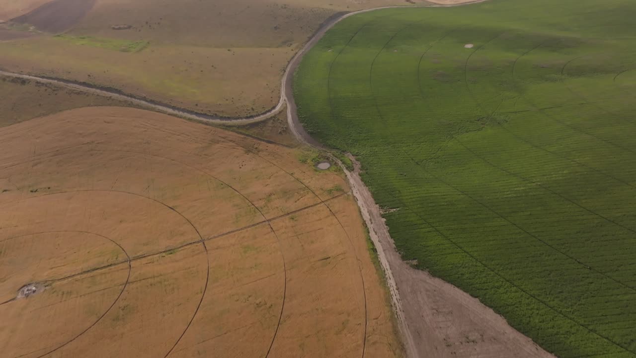 Aerial View of Farmlands with Geometric Fields and Irrigation Systems