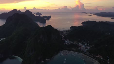 Aerial-view-of-beautiful-karst-scenery-and-ocean-waters-around-El-Nido,-Palawan,-Philippines