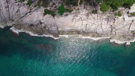 aerial flight above tropical island and the sea