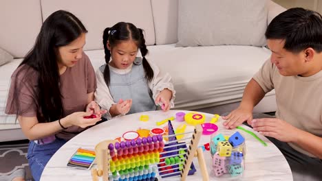 A family enjoys crafting with modeling clay at home, fostering creativity and connection. Bright colors and a cozy setting enhance the joyful mood