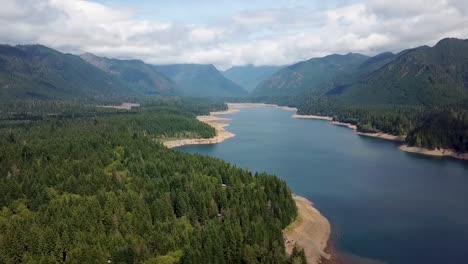 scenic view of the wynoochee lake inside the olympic national park, port angeles, washington - aerial drone, panning shot