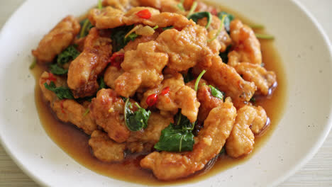 stir-fried-fried-fish-with-basil-and-chili-in-thai-style---Asian-food-style