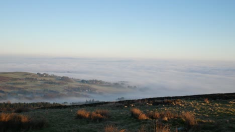 idyllic fog clouds passing lancashire countryside moorland valley at sunrise