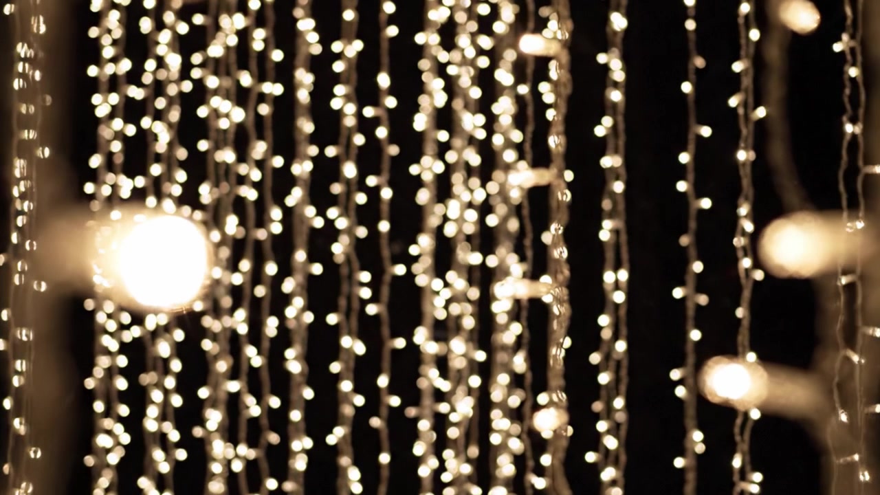 A Captivating Display of Twinkling Fairy Lights Glimmering Against a Dark Background, Creating a Magical Atmosphere Perfect for Celebrations and Festivities.