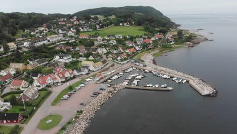 Wide-view-of-Arild-Sweden-during-a-cloudy-day,-aerial