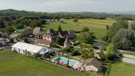 aerial establishing shot of a wedding venue set up with an outdoors marquee