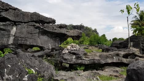 Unique-rock-formations-which-used-to-be-underwater-in-Rammang-Rammang,-,-Makassar,-Indonesia