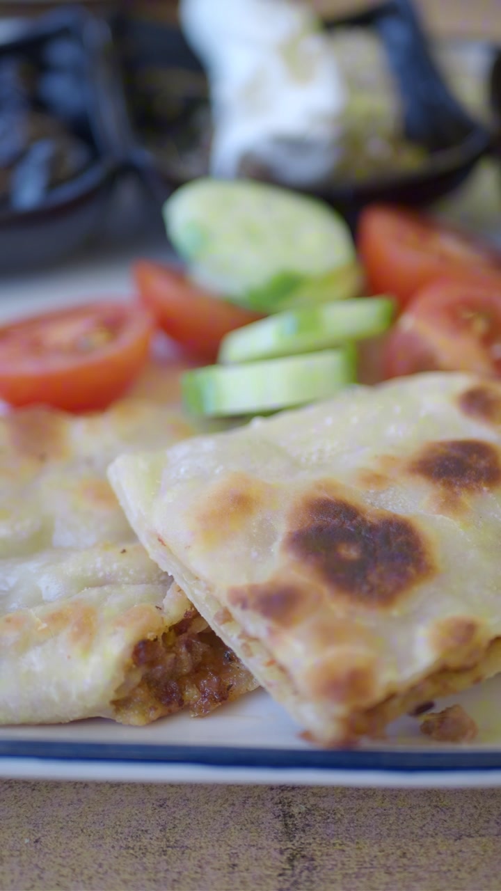 Close-up of Traditional Turkish Gozleme with Fresh Vegetables
