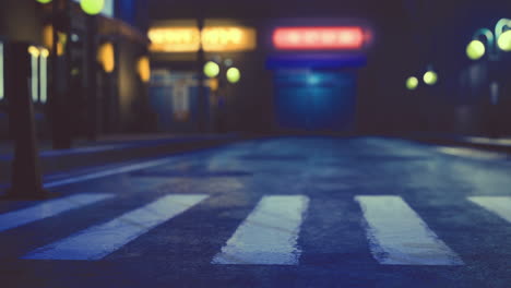 nighttime street with glowing lamps and empty crosswalk in urban setting