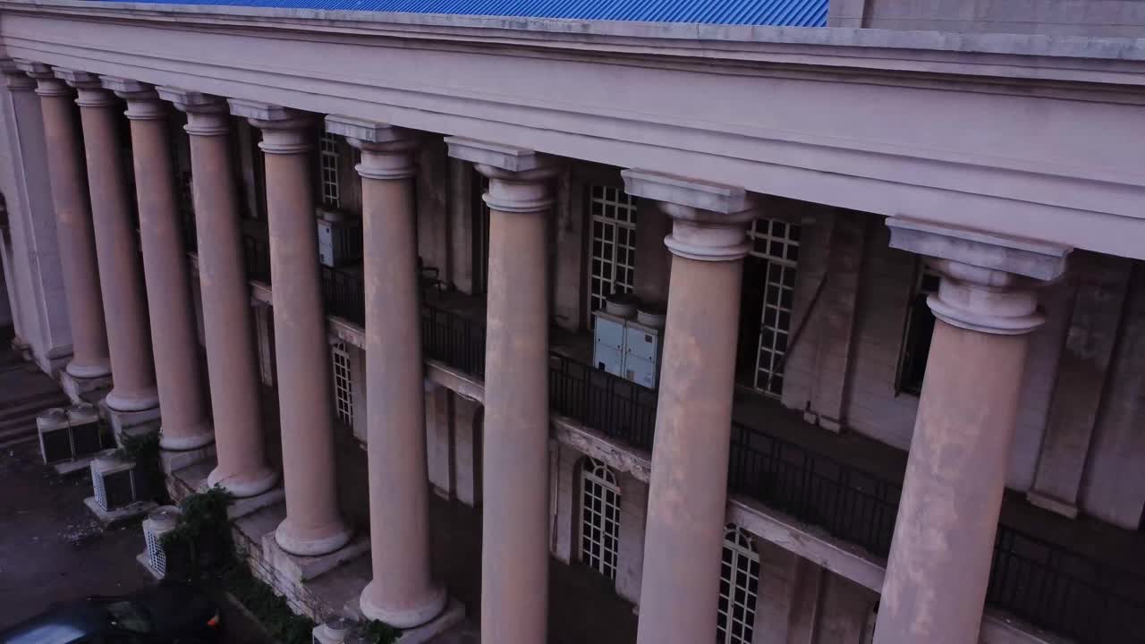 High angle pan of beautiful columns at an old monumental building, Ibadan, Nigeria