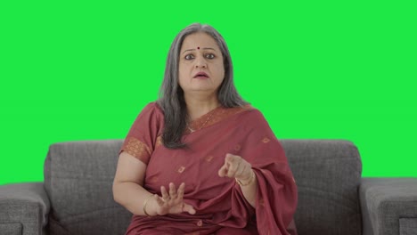 Angry-Indian-old-woman-shouting-on-someone-Green-screen