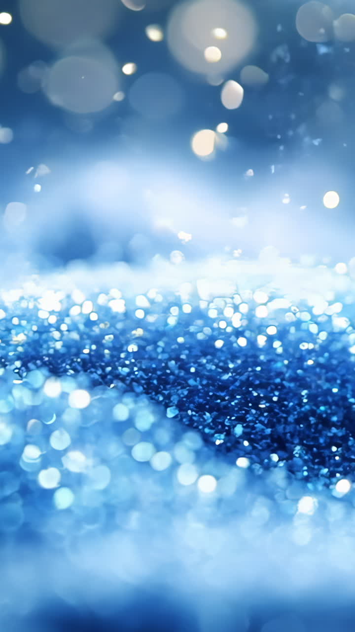 A snow covered hill with a blue sky in the background. The snow is sparkling and the sky is clear