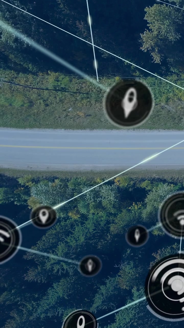 Vertical video: Blue vehicle entering on road sending lit lines and icons forming network overlay