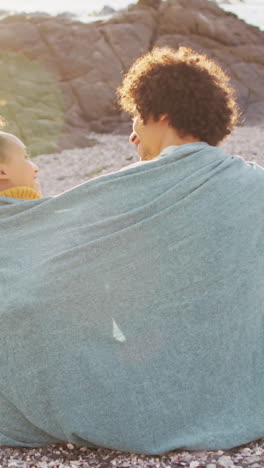 biracial couple enjoys a sunset outdoors, with copy space